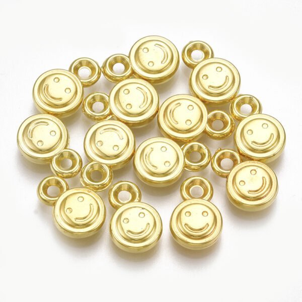 Dijes smile colgantes dorados por 50 gramos