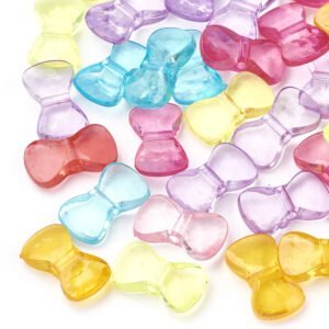 Dijes pasantes de moños de acrílico colores variados precio por 50 gramos