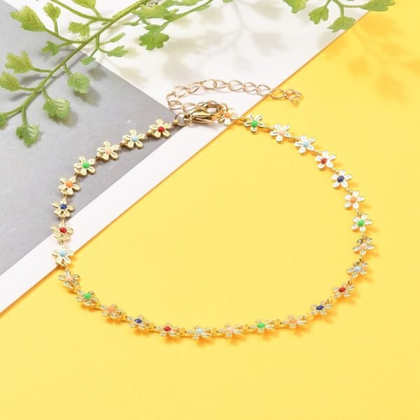 Pulsera con flores laminada oro 18k/goldfilled