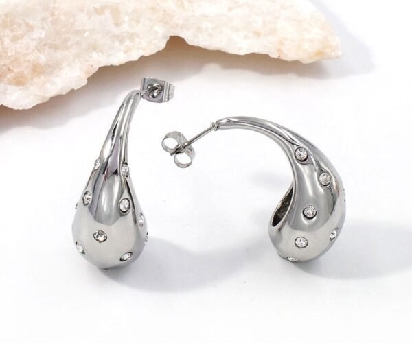 Par de aros drops plateados circones