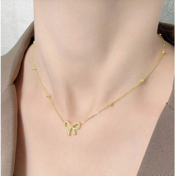 Collar moño gold