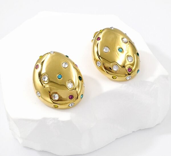 Aros ovales golden circonitas de colores