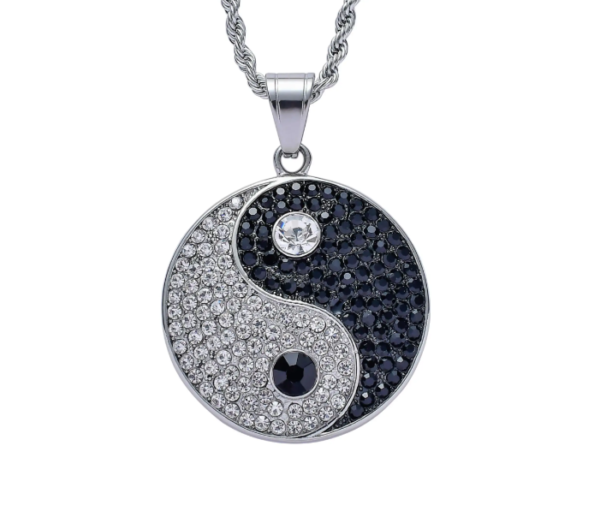 Dije plateado ying y yang con circones