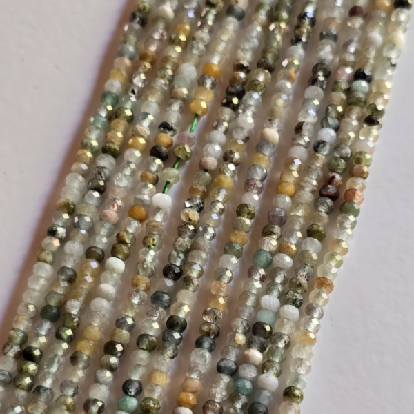 Tira rondelle facetada cuarzo rutilado verde 3x2mm